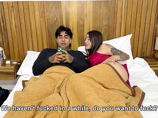 Hot MILF cheats next to her husband with a younger blonde Latina