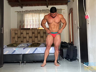 Sexy Colombian Bodybuilders Flexes His Sweaty Muscles.