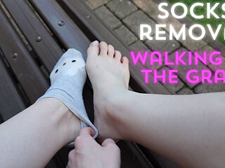 Socks Removal and Walk Barefoot on the Grass