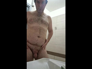 completely naked in a public bathroom