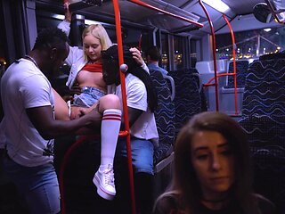 Antonio Black pounds Emily Cutie's tight ass in a steamy threesome on the city bus