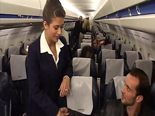 Sexy flight attendant rides passenger's cock after the flight