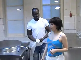 German babe gives a deepthroat blowjob in the kitchen