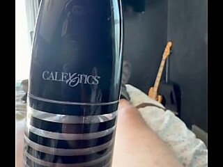 Amateur GF gives a hand job with a penis pump and ends up covered in cum