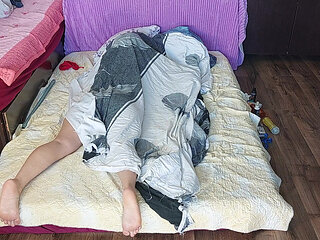 Foreplay in the bedroom with an amateur couple.