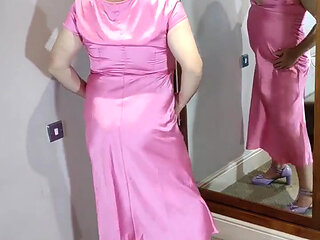 Sexy crossdresser in gorgeous pink satin ball gown