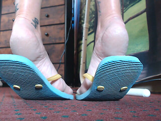 Blue rubber flipflop shoeplay