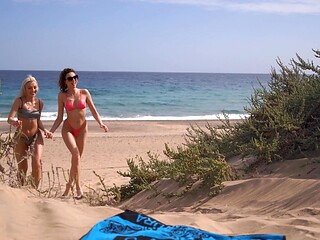 Isabella and Lovita's wild beach romp: sun-kissed skin, steamy 69 action, naughty as* play