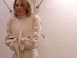 Rose suspended in a Max Cita straitjacket