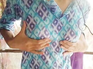 Hot and horny Indian housewife masturbates standing up