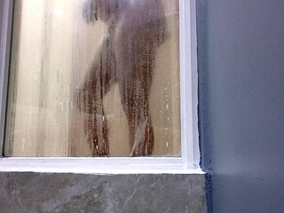 I take a nice bath at the hotel while I wait to relax.