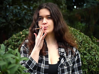 Sweet and Busty Russian Babe Smoking Cigarette in Nature