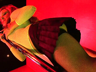Curly haired babe gives pleasure and takes in a red room