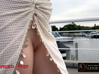 Flashing pussy in see through bikini cover on the marina
