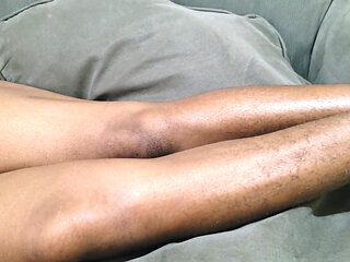 A Woman with Lots of Beautiful Pubic Hair Between Her Legs Lies on Her Sofa Waiting to Be Made Love to Her