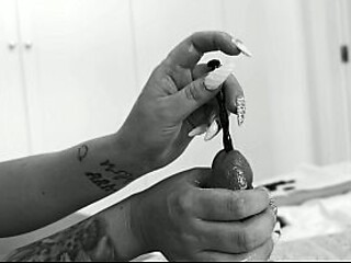 Femdom. a Busty Dominatrix Inserts Dilators Into a Stretch-wrapped Sex Slave's Urethra Until He Orgasms