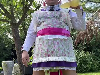 In gardener's clothes to take a piss shower outside fully dressed