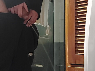 Peeing with a hard cock