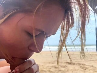 Step-sis sucks cock on the beach