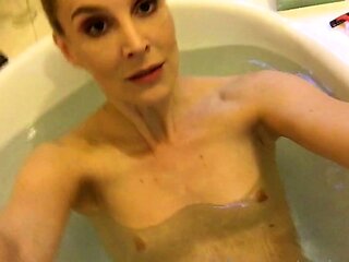 Busty amateur milf masturbates in the shower