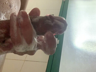 Cleaning the cock in the shower