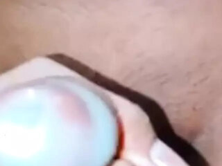 Shake the condom and drain the water