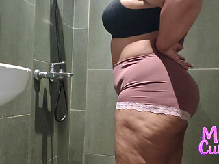 Candid Camera Peeking at a hot BBW wife while she's taking a shower.