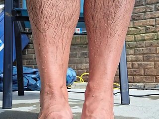 Posing my wet legs and feet by the pool before I jerk off and cum