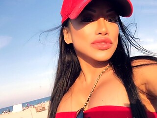 Busty babe playing with her big boobs
