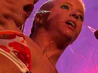 Tattooed MILF Slut with Fake Tits Squirts Her Pussy Raw!