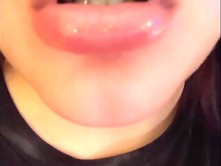 Pretty girl with big lips spits on cock