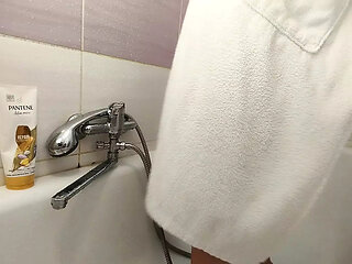 Amateur wife takes a shower.