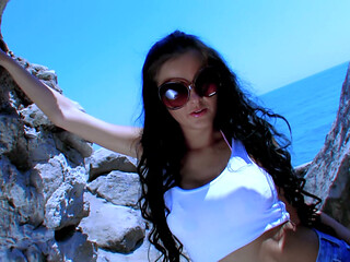 Candy Alexa: Pornostar Petite Brunette with Big Boobs Candy Alexa Doing a Strip in the Rocks