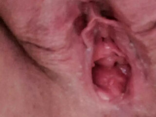 Pissing in close up with open pussy