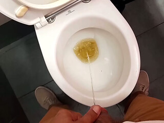 I'_m taking a piss in the public restrooms at the gas station