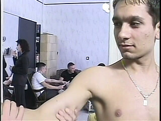 Guy is half naked and flexing for the camera