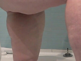 A Bathroom Camera Watches a Mature Wife. a Busty MILF Shaves Her Legs. PAWG.