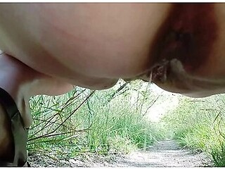 German Milf Walking In The Park Showing Off Her Charms Under Her Skirt Wanted To Pee