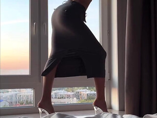 stretching high heels ans long tight skirt