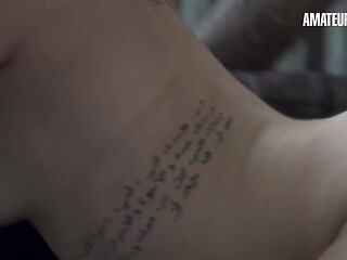 Tattooed blonde bounces on couch in rough doggy style