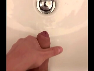 Man jerking in sink full with cum wet