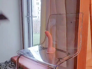 Horny schoolgirl rides a huge dildo on a Transparent chair with the view from underneath the chair. First dual camera try!