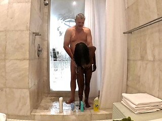 Sexy Black Milf takes a hot steamy shower with white sugar daddy at his penthouse