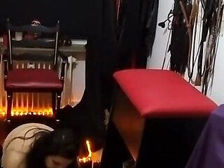 Busty Dominatrix Teases Bound Slave's Throbbing Cock in Dungeon