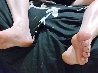Massaging my feet and legs with oil
