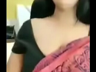 Indian teen shows off her big boobs while dancing on webcam