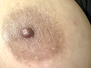 Hot mom massages her huge tits all full of oil