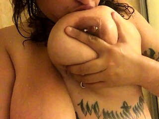 Busty curly brunette with big boobs fucks on couch