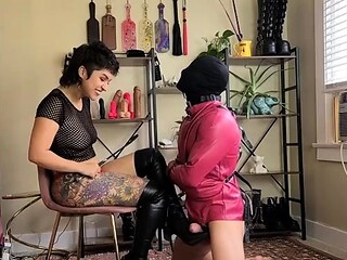Merciless mistress straps up to fuck pitiful masked slave