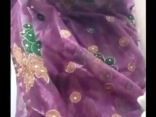 Indian Gay Crossdresser Bottom Gaurisissy pressing and playing with her big boobs in purple saree with heavy jwellery